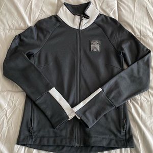 Oiselle reflective power on jacket - size large
